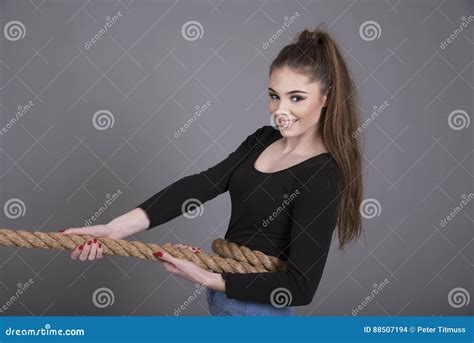 2 girls pulling a rope|Girl Pulling Rope Pictures, Images and Stock Photos